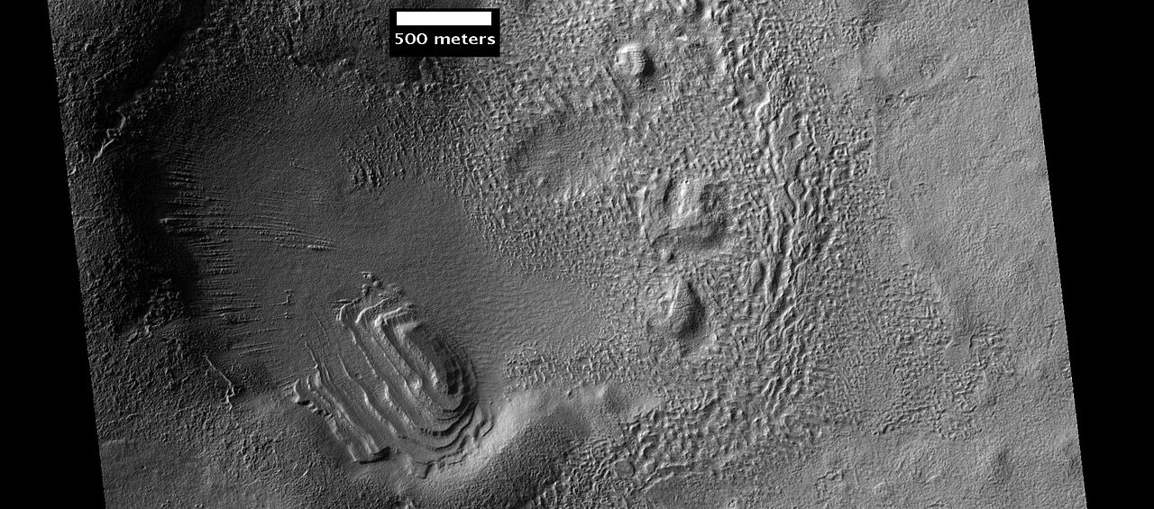 Set of dipping layers in crater
