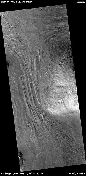 Close view of lineated valley fill on left and mantle on right, as seen by HiRISE under HiWish program